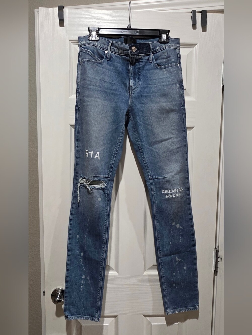 RtA Faded Blue Skinny Jeans with White Logos